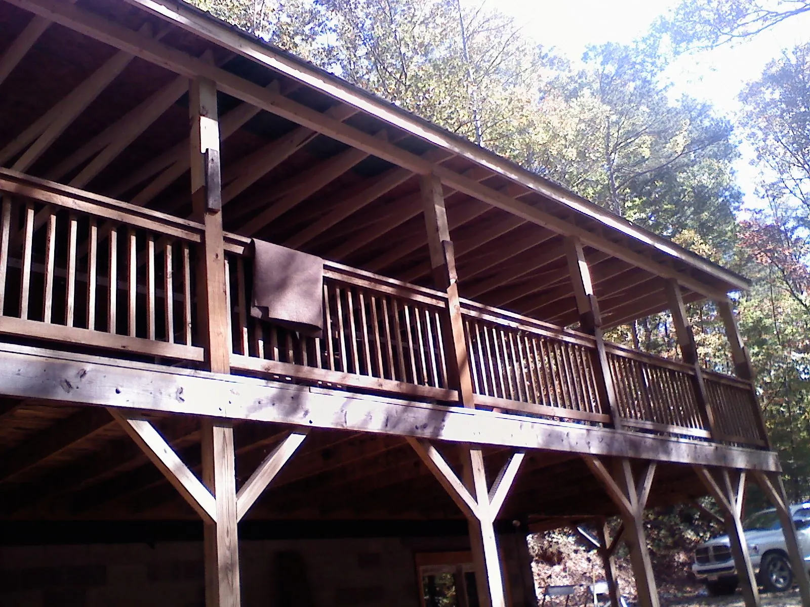 Timber framing under a new elevated porch and deck — Roof Leak Repair in Bowers by Roofing Brothers